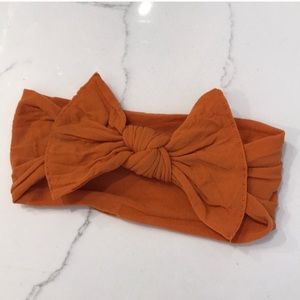 Burnt orange/pumpkin babybling bow